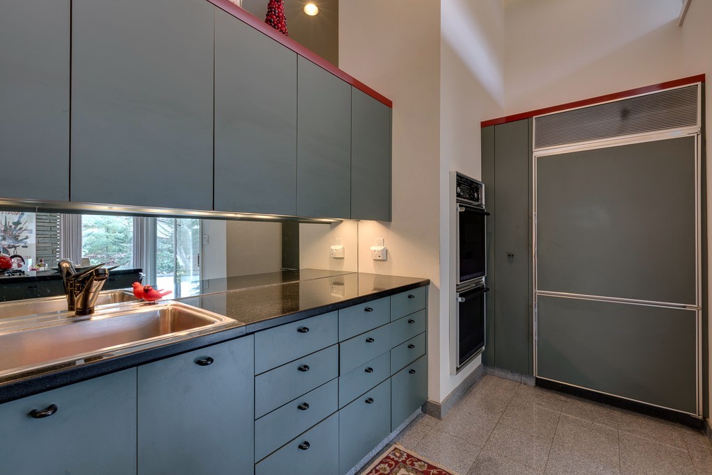 64 Oak Hill Road Worcester, MA 01609 - Photo 10 of 23 a kitchen with stainless steel appliances kitchen island sink refrigerator and cabinets