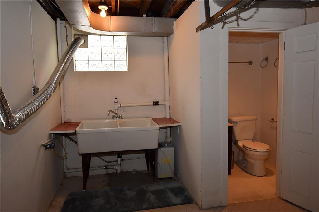 250 Cochran Road Mt. Lebanon, PA 15228 - Photo 17 of 20 Laundry area and 3rd bathroom. Bathroom needs some tlc.