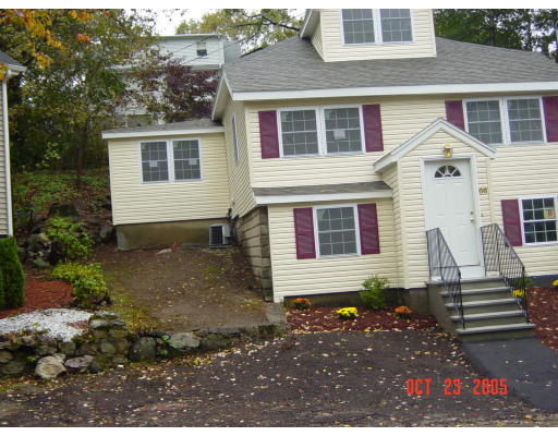 66 Springdale Avenue Saugus, MA 01906 - Photo 1 of 14 a view of a house with a yard