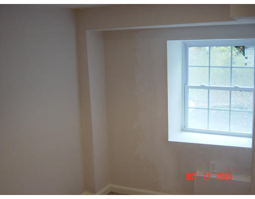 66 Springdale Avenue Saugus, MA 01906 - Photo 13 of 14 a view of an empty room with a window