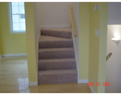 66 Springdale Avenue Saugus, MA 01906 - Photo 6 of 14 a view of staircase with white walls