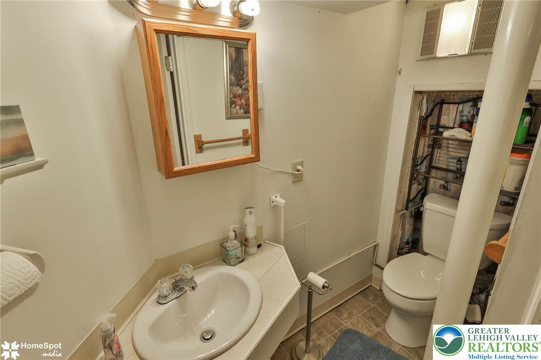 3069 Shakespeare Road Bethlehem, PA 18017 - Photo 35 of 50 A well-appointed vanity with a full-size mirror and ample counter space anchors this convenient bathroom.