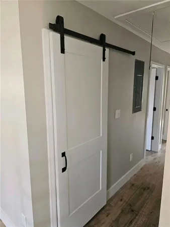 a bathroom with a shower and a mirror