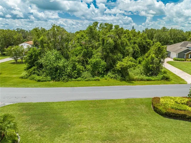 a view of a yard with an outdoor seating