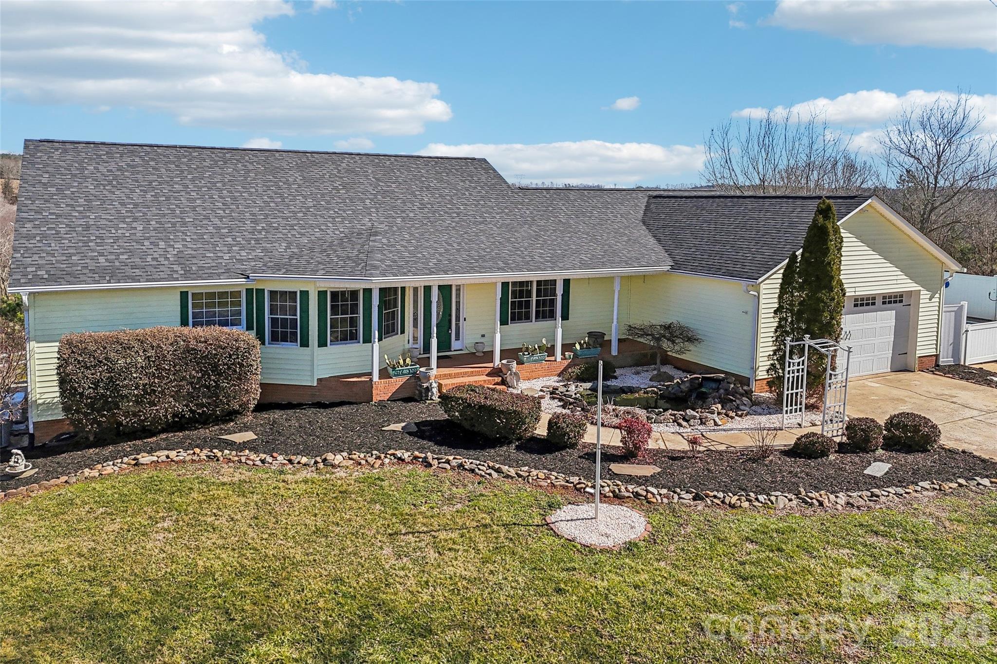 2034 New Prospect Church Road Shelby, NC 28150 - Photo 1 of 48 a living room with furniture a couch and large window