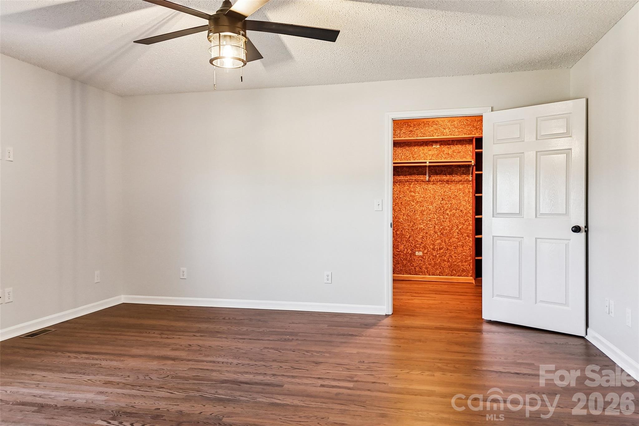 2034 New Prospect Church Road Shelby, NC 28150 - Photo 17 of 48 an empty room with wooden floor closet and windows