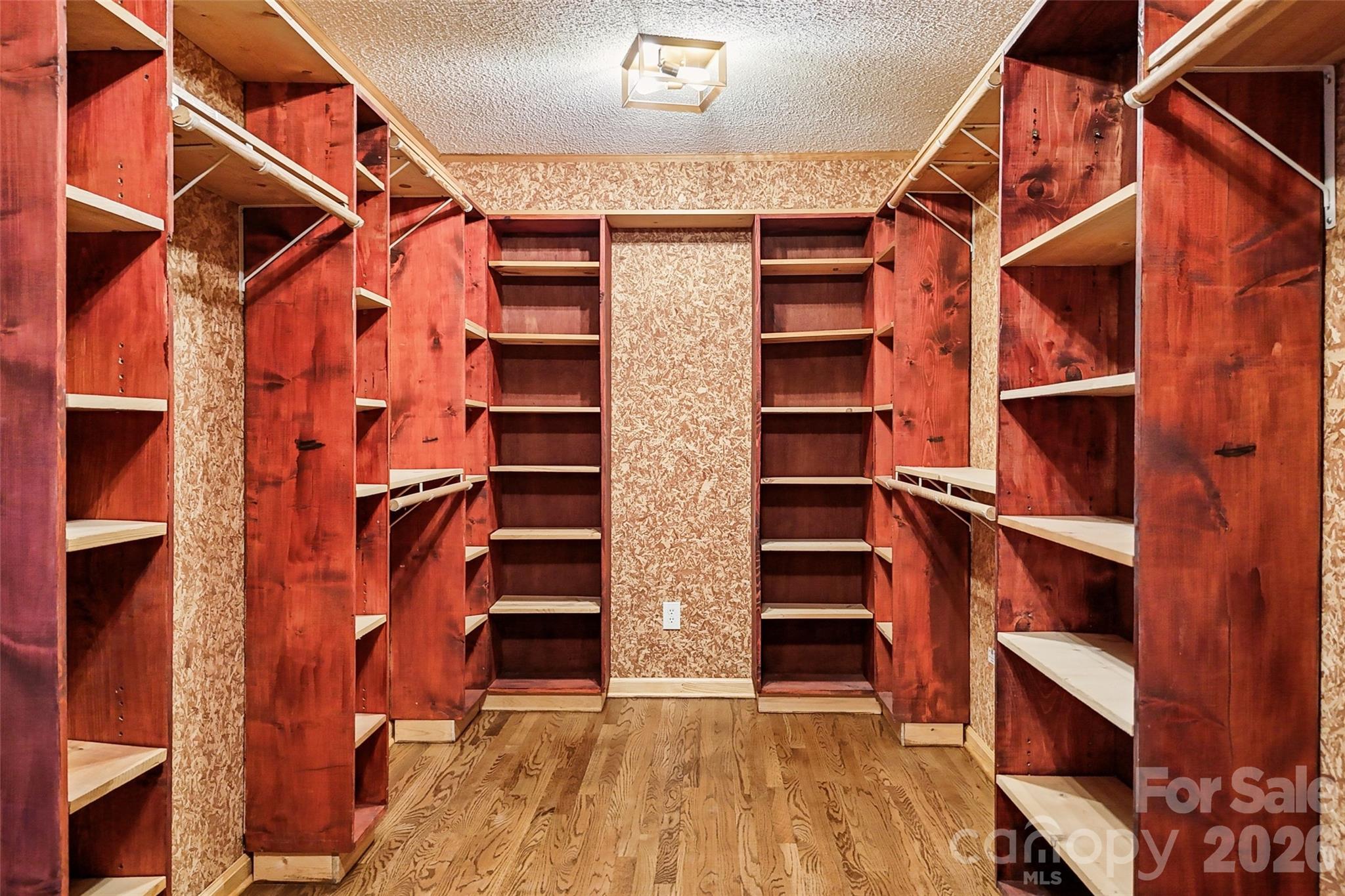 2034 New Prospect Church Road Shelby, NC 28150 - Photo 19 of 48 a view of walk in closet with clothes and shoes