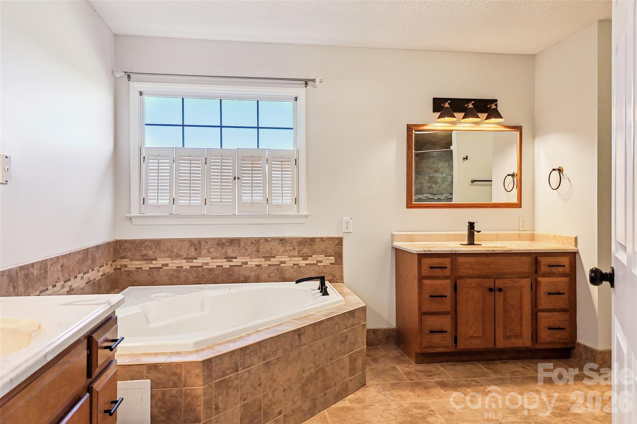 2034 New Prospect Church Road Shelby, NC 28150 - Photo 20 of 48 a bathroom with a bathtub and a sink