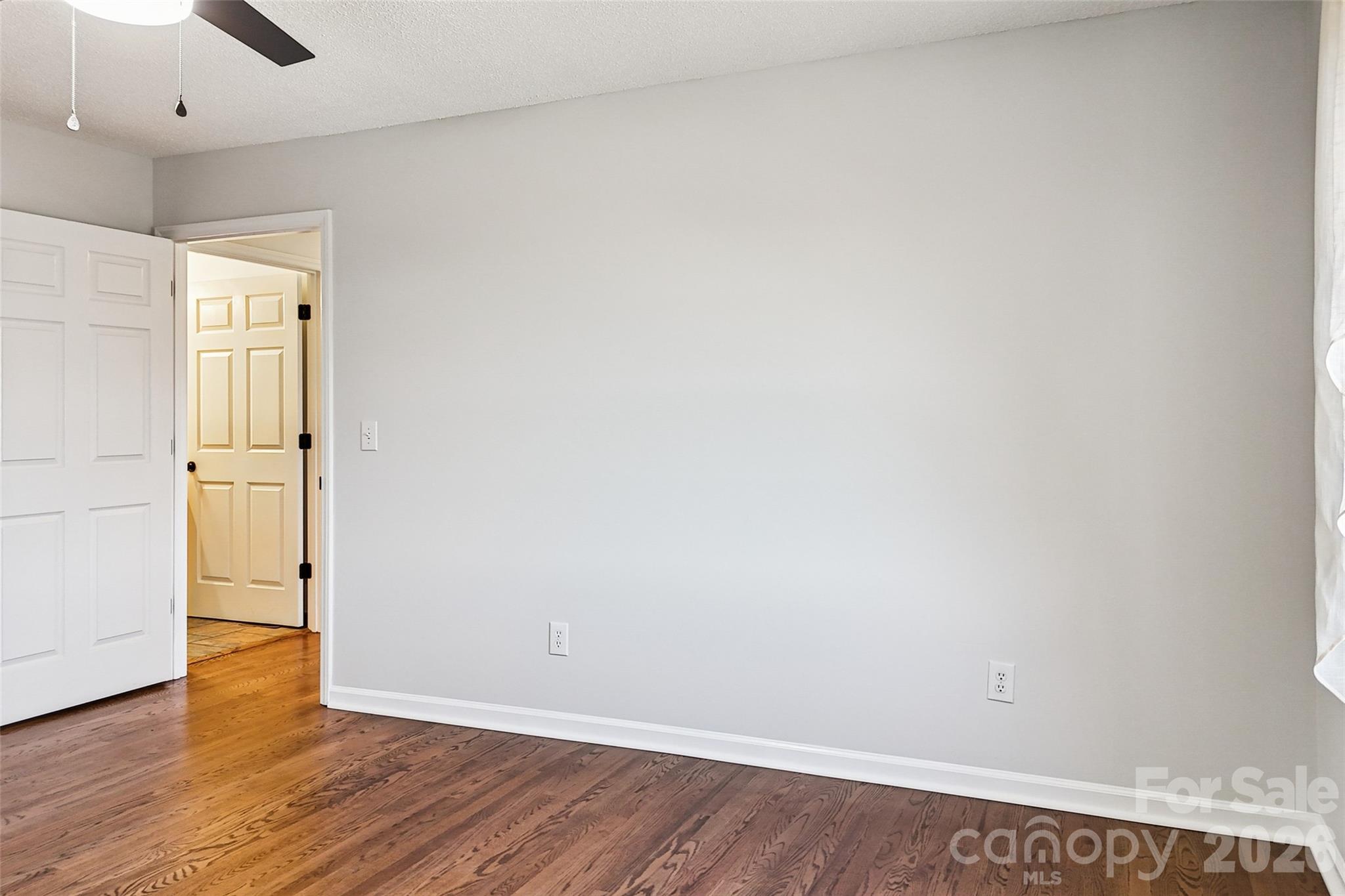 2034 New Prospect Church Road Shelby, NC 28150 - Photo 26 of 48 a view of an empty room with wooden floor
