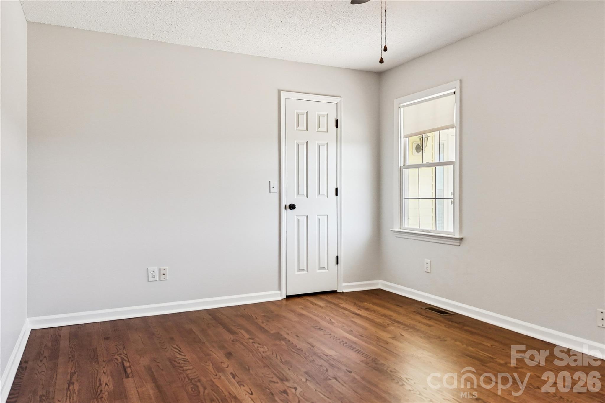 2034 New Prospect Church Road Shelby, NC 28150 - Photo 27 of 48 an empty room with wooden floor and windows