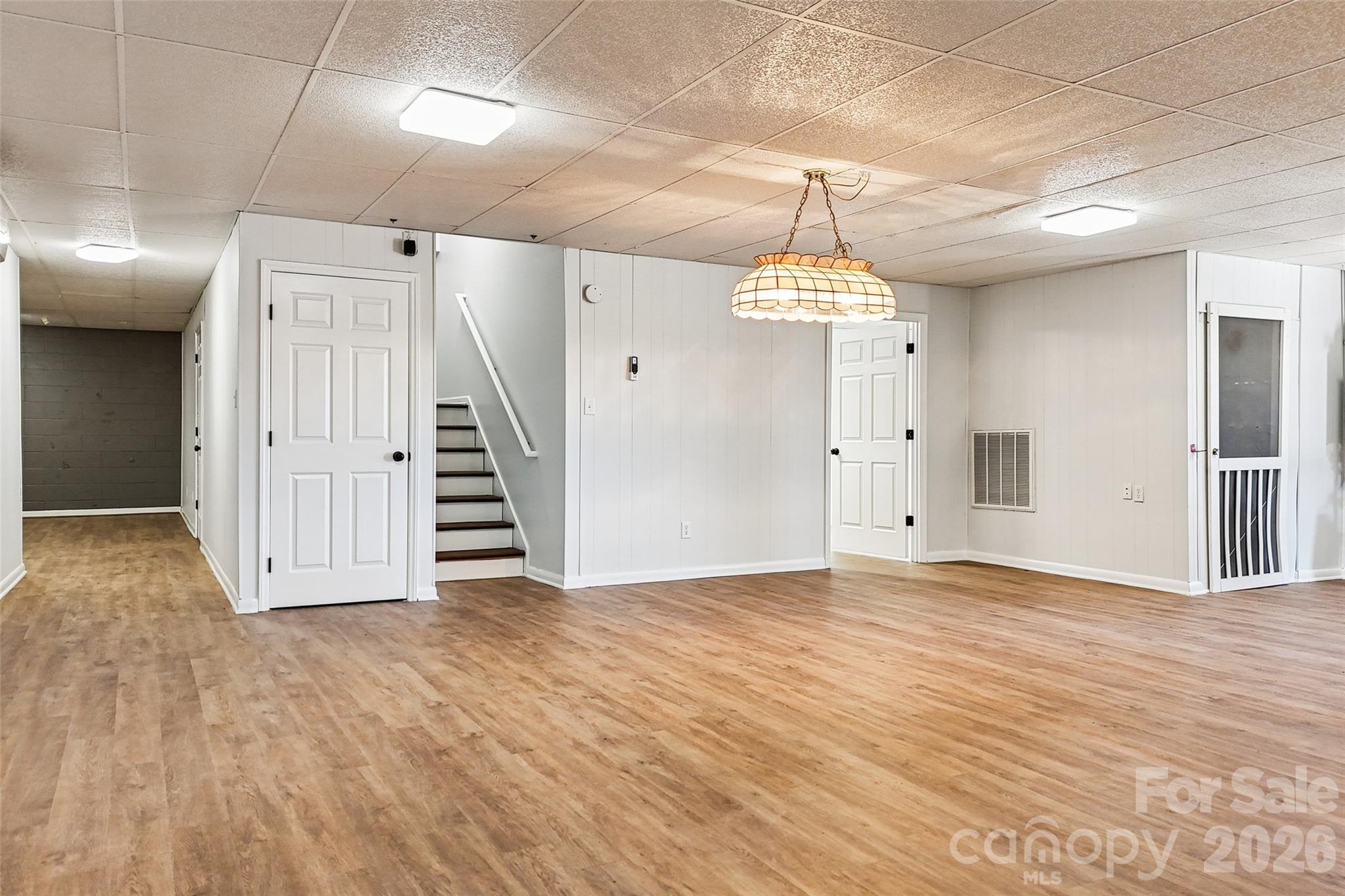 2034 New Prospect Church Road Shelby, NC 28150 - Photo 32 of 48 a view of an empty room with wooden floor and entryway