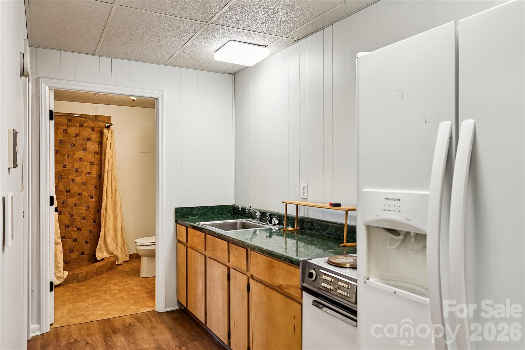 2034 New Prospect Church Road Shelby, NC 28150 - Photo 35 of 48 a kitchen with stainless steel appliances granite countertop a refrigerator and a stove