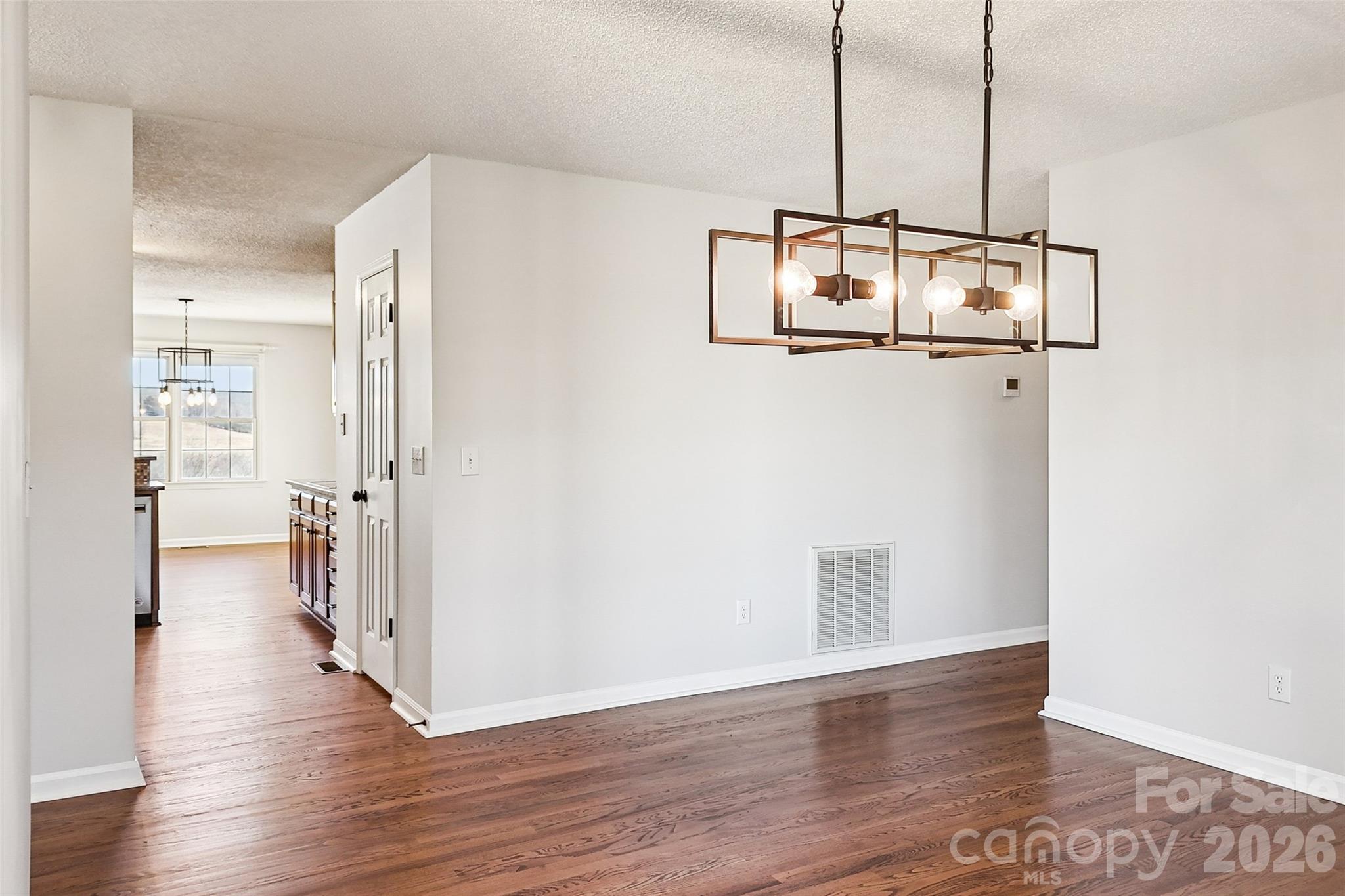 2034 New Prospect Church Road Shelby, NC 28150 - Photo 8 of 48 a view of a hallway with wooden floor