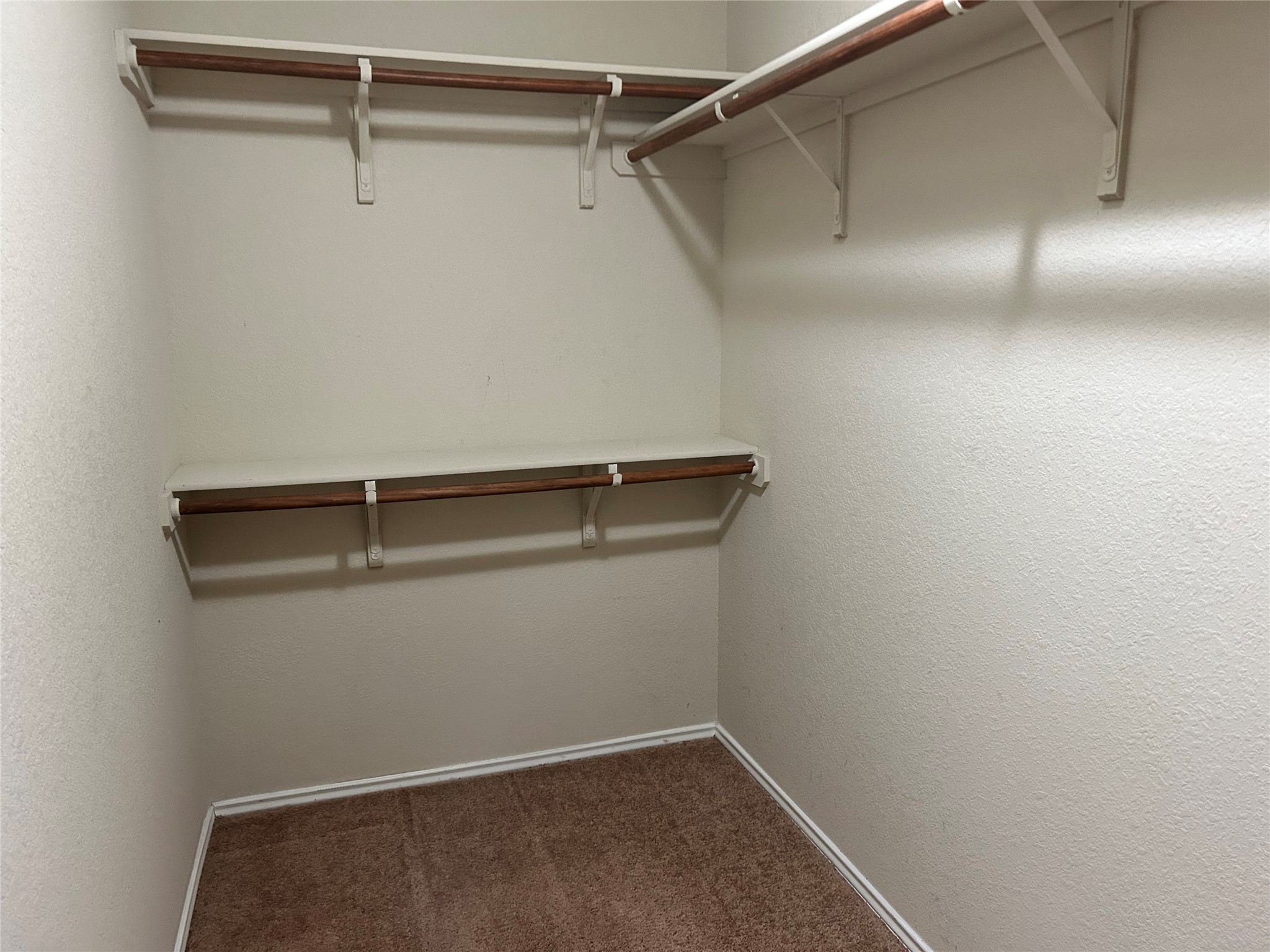 211 Animas Drive Georgetown, TX 78626 - Photo 14 of 25 a view of a room with racks on the wall