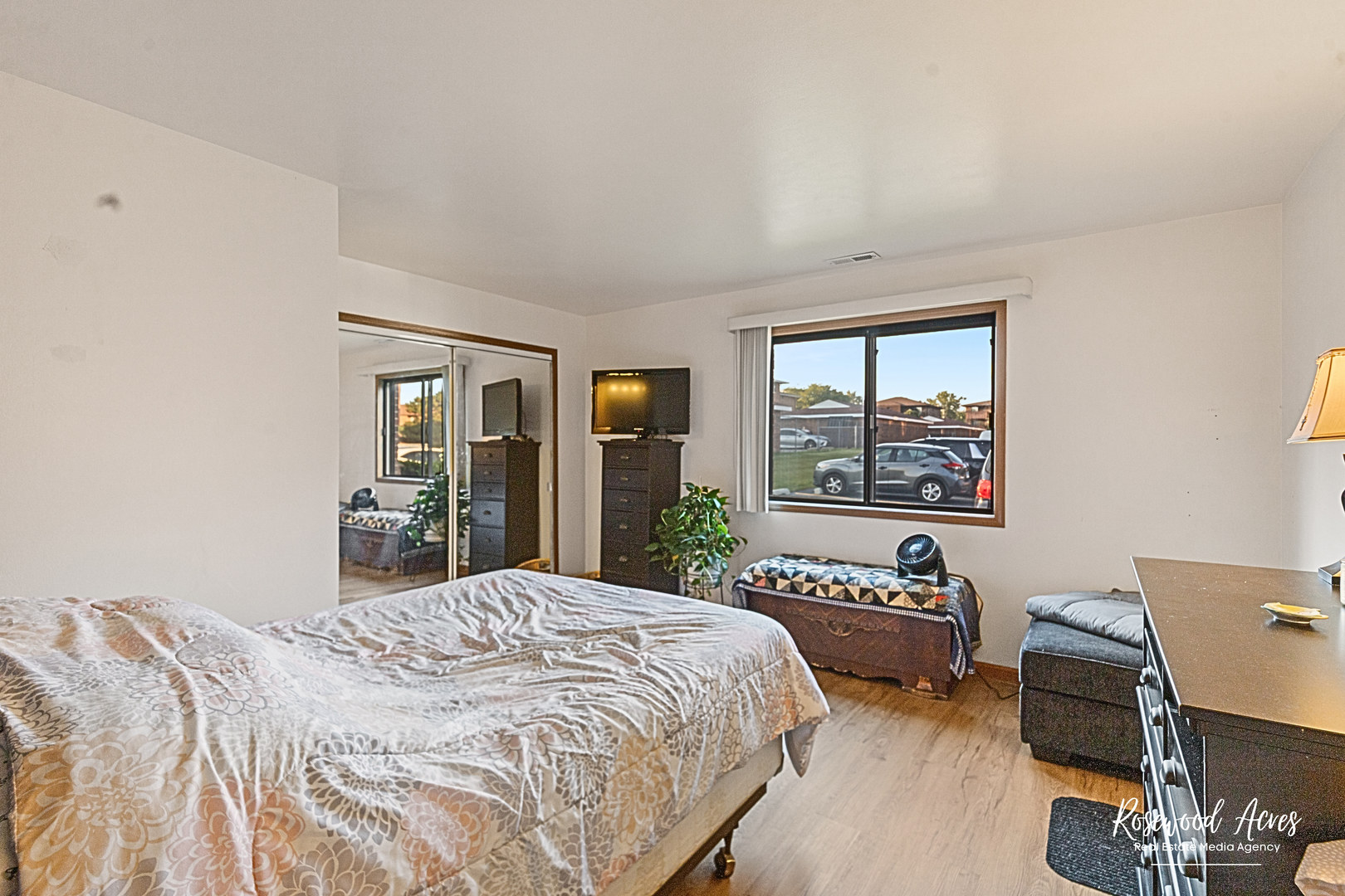 15718 Peggy Lane, Unit 2 Oak Forest, IL 60452 - Photo 11 of 16 a bedroom with a bed and a window