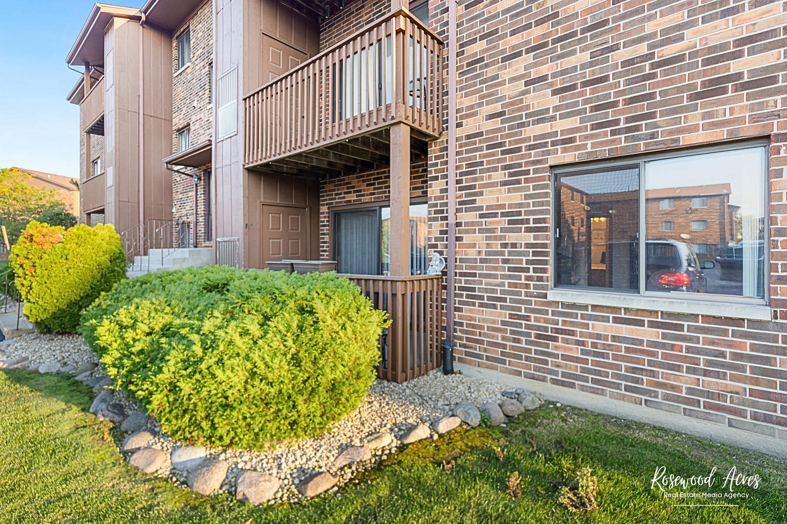 15718 Peggy Lane, Unit 2 Oak Forest, IL 60452 - Photo 16 of 16 a view of a brick house with a yard