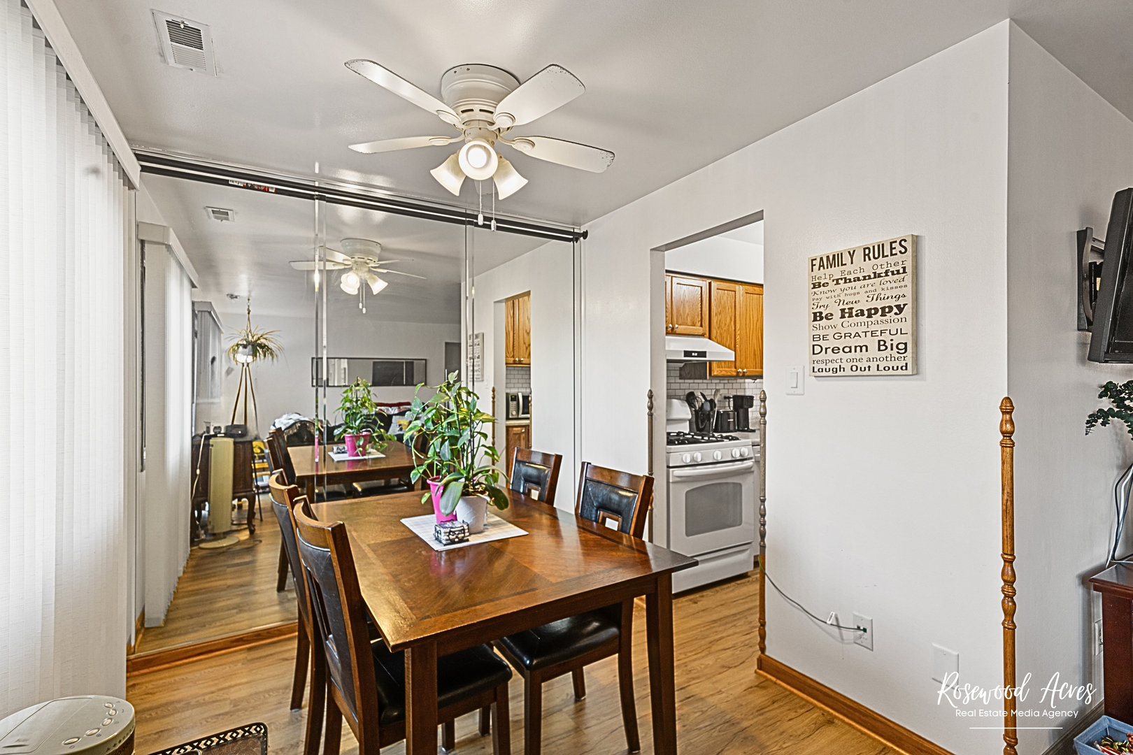 15718 Peggy Lane, Unit 2 Oak Forest, IL 60452 - Photo 5 of 16 a view of a dining room with furniture and a chandelier