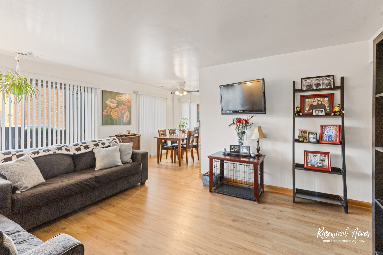 15718 Peggy Lane, Unit 2 Oak Forest, IL 60452 - Photo 7 of 16 a living room with furniture and a flat screen tv