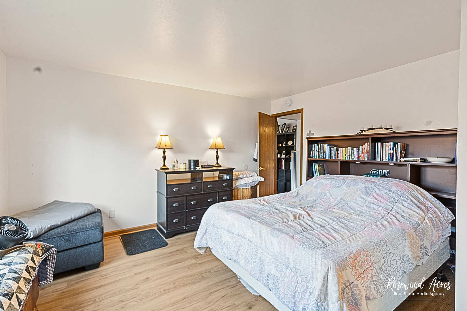 15718 Peggy Lane, Unit 2 Oak Forest, IL 60452 - Photo 10 of 16 a bed room with a bed and a dresser