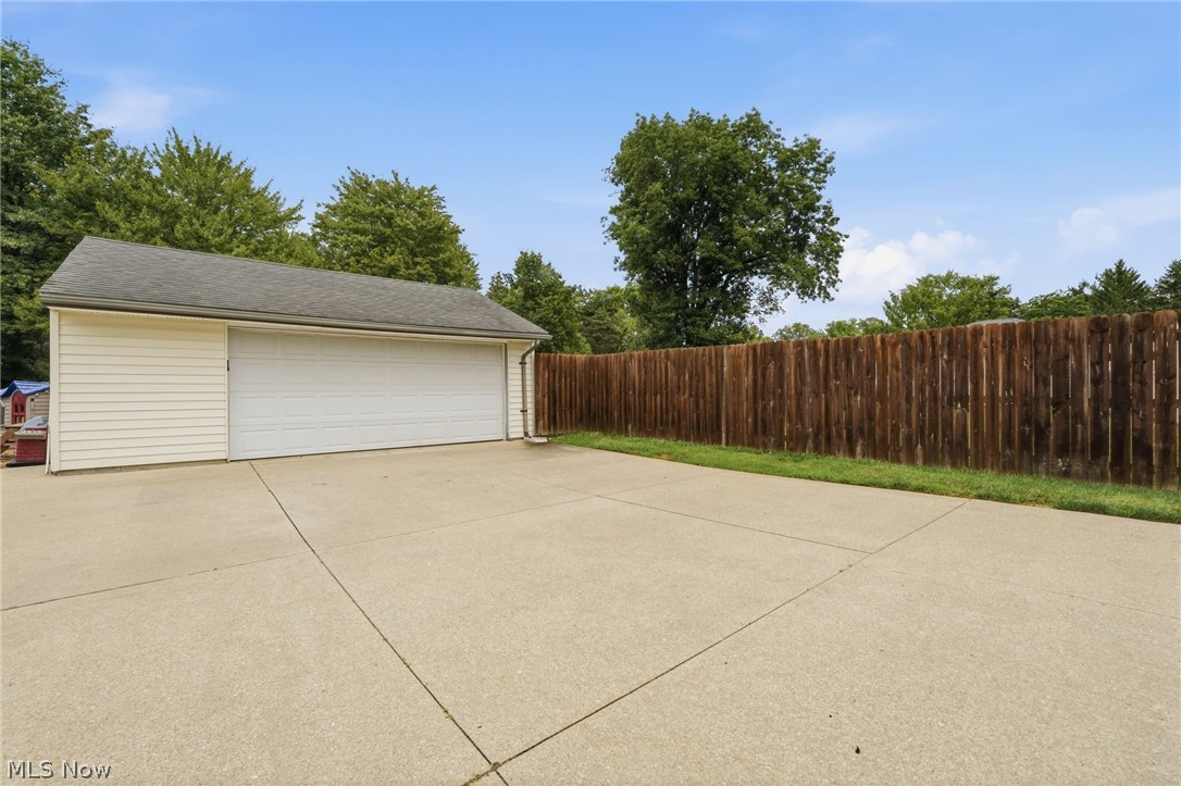 21704 Boston Road Strongsville, OH 44149 - Photo 36 of 50 2.5 car garage and ample parking or patio space - room for both!