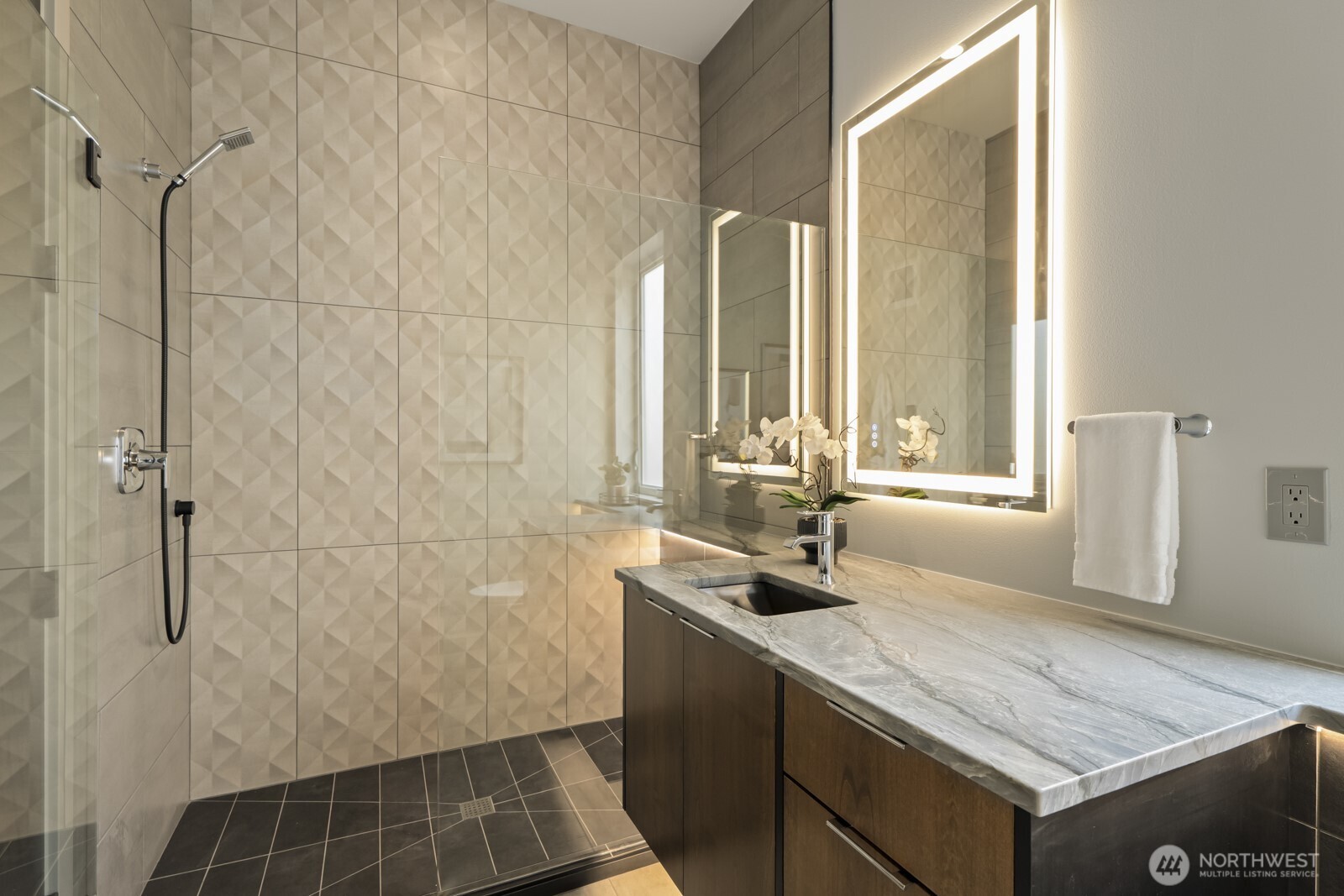 5009 Ocean Avenue Everett, WA 98203 - Photo 21 of 40 a bathroom with a granite countertop sink a mirror and shower