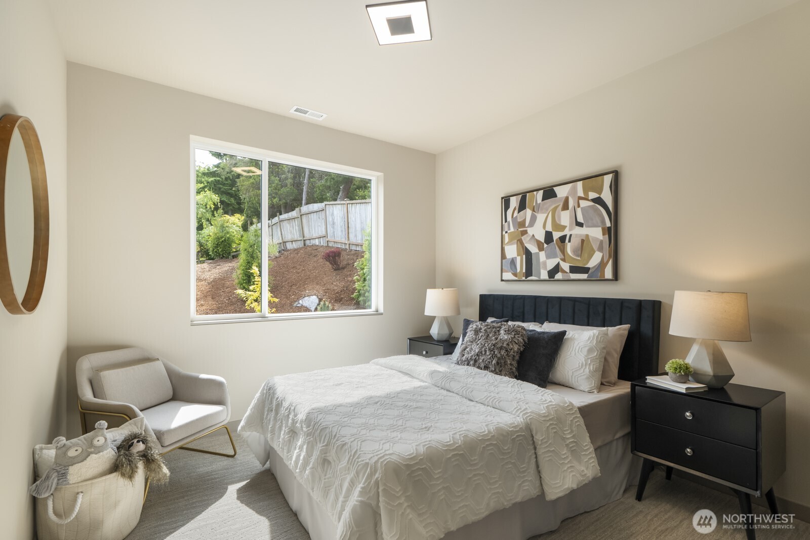 5009 Ocean Avenue Everett, WA 98203 - Photo 25 of 40 a bedroom with a bed and window