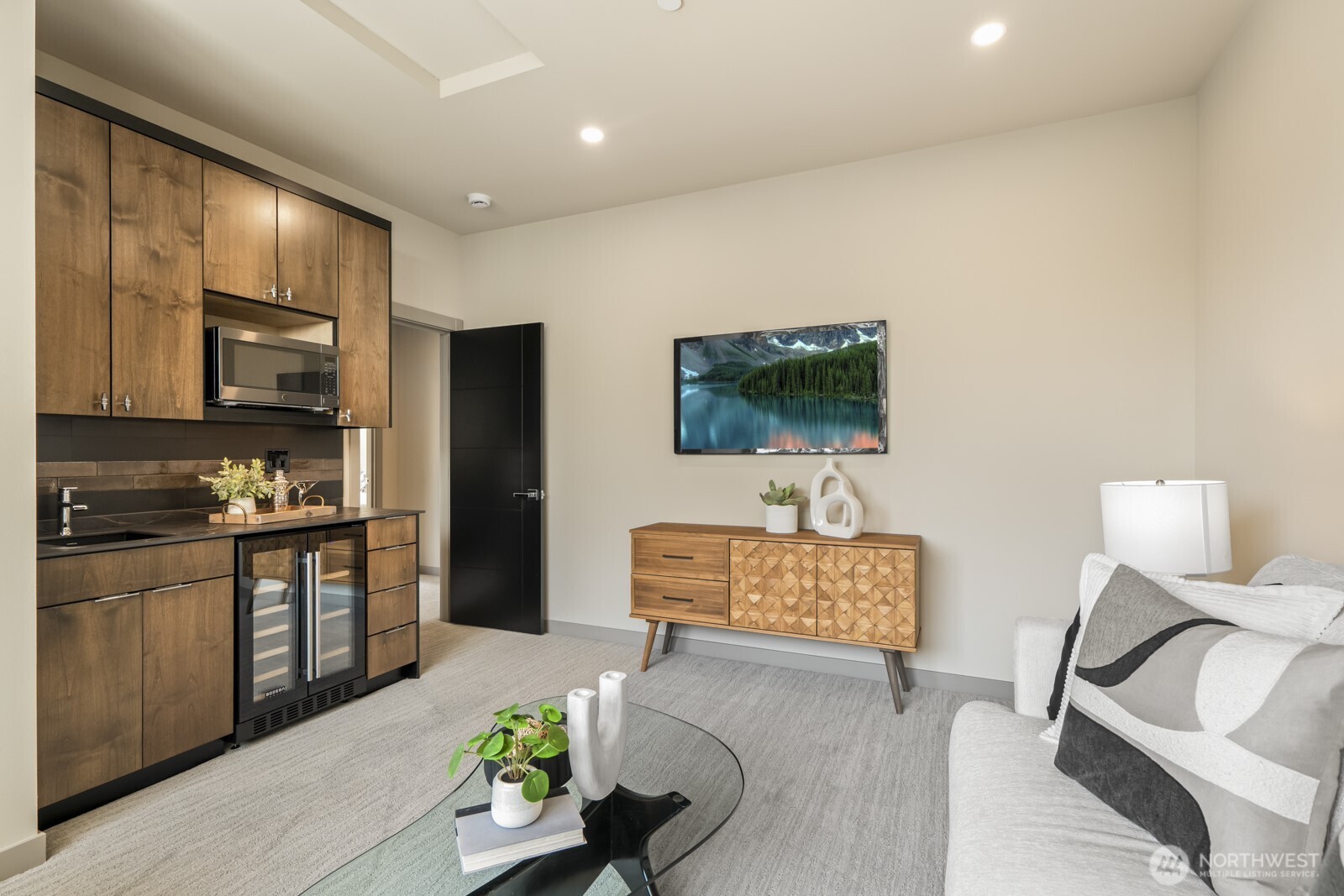 5009 Ocean Avenue Everett, WA 98203 - Photo 26 of 40 a living room with stainless steel appliances furniture and a flat screen tv