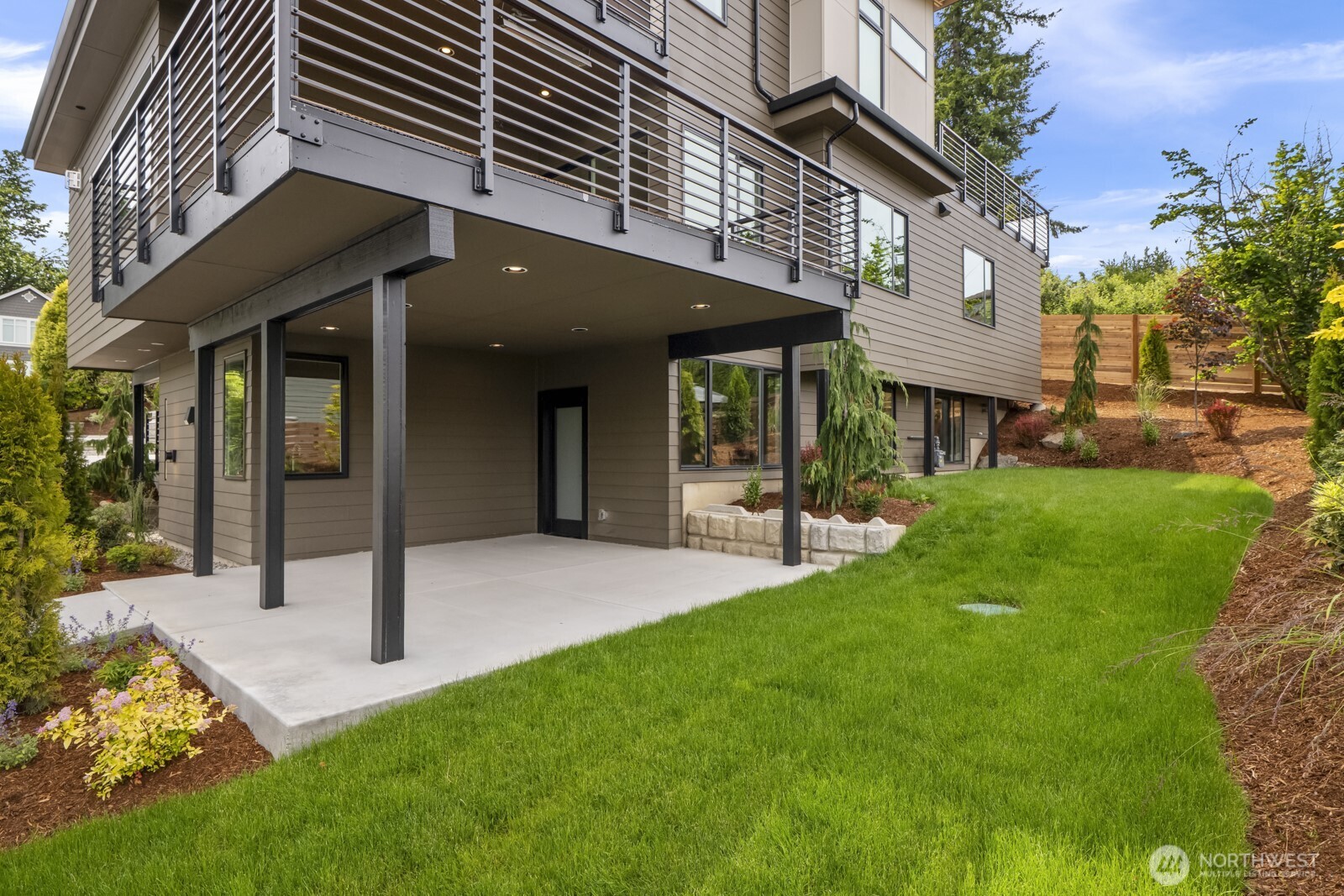 5009 Ocean Avenue Everett, WA 98203 - Photo 29 of 40 a view of a house with a yard porch and sitting area