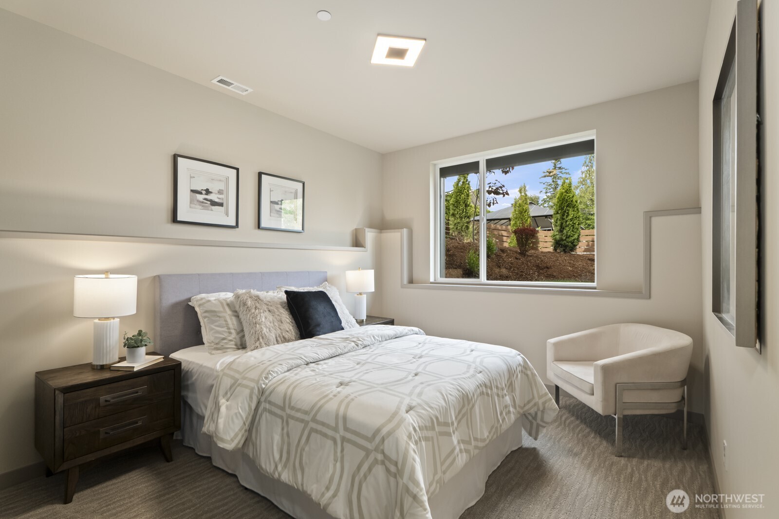 5009 Ocean Avenue Everett, WA 98203 - Photo 34 of 40 a bedroom with a bed and a couch