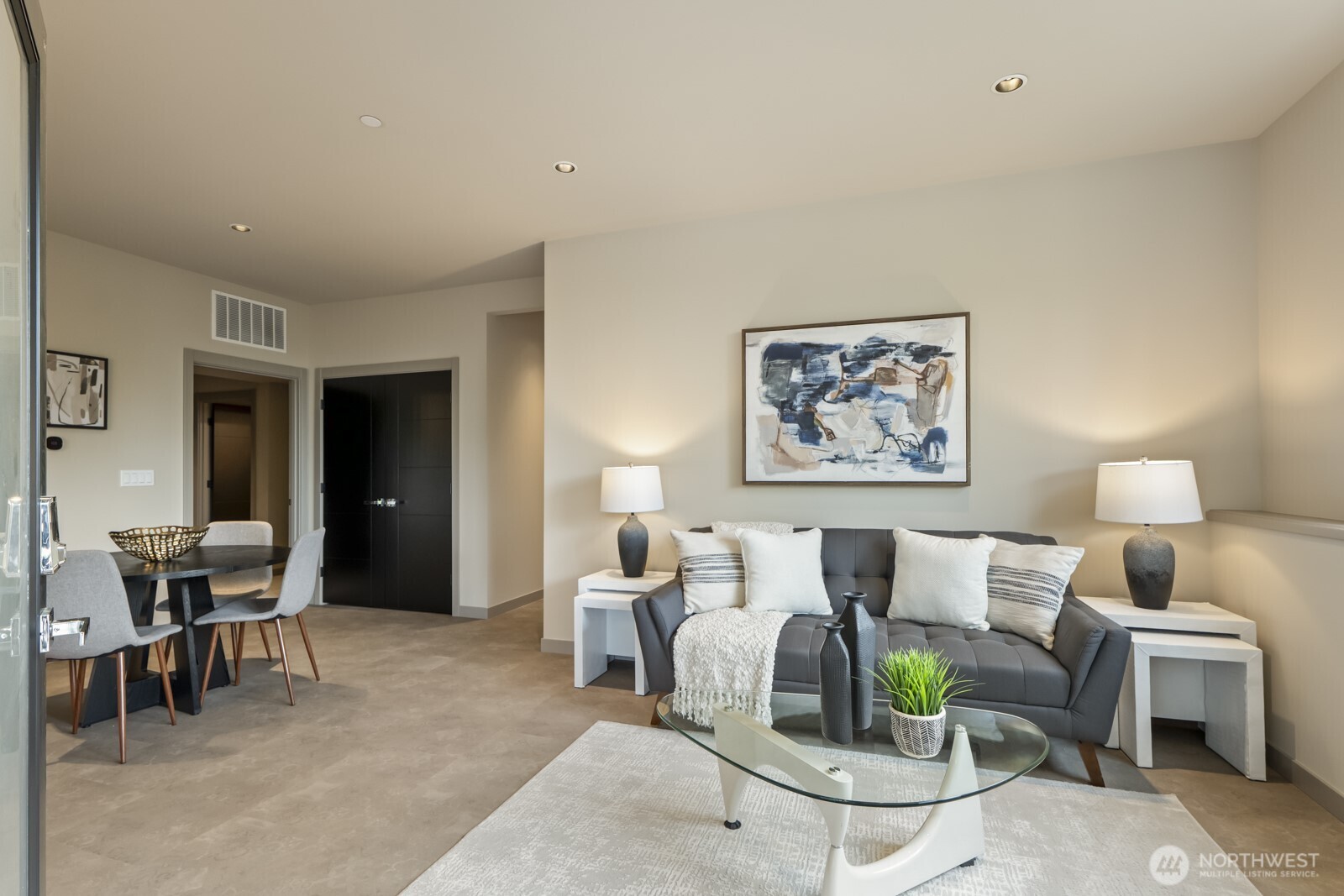 5009 Ocean Avenue Everett, WA 98203 - Photo 35 of 40 a living room with furniture a dining table and with potted plants