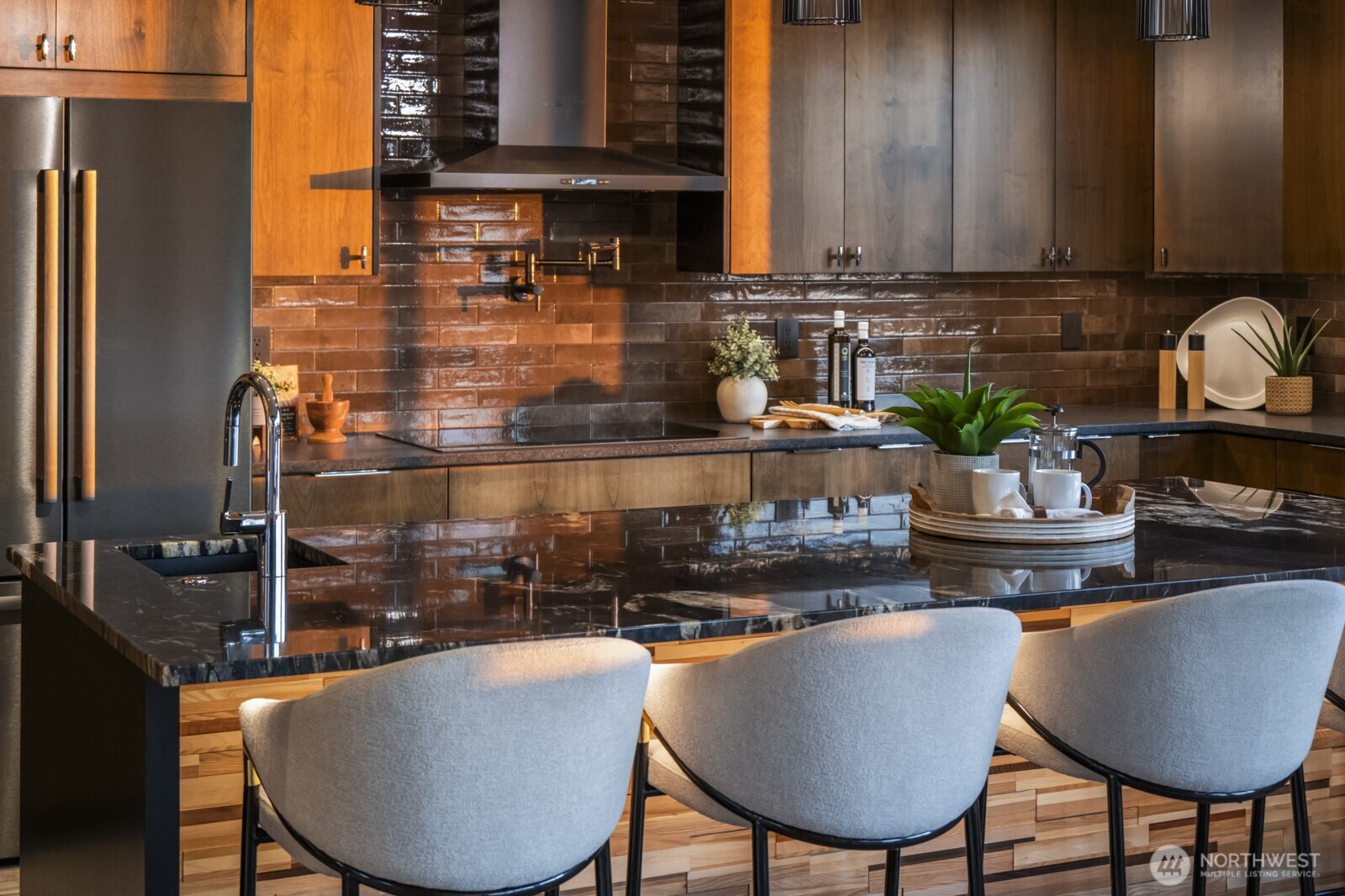 5009 Ocean Avenue Everett, WA 98203 - Photo 7 of 40 a kitchen with a table chairs and a wooden cabinets