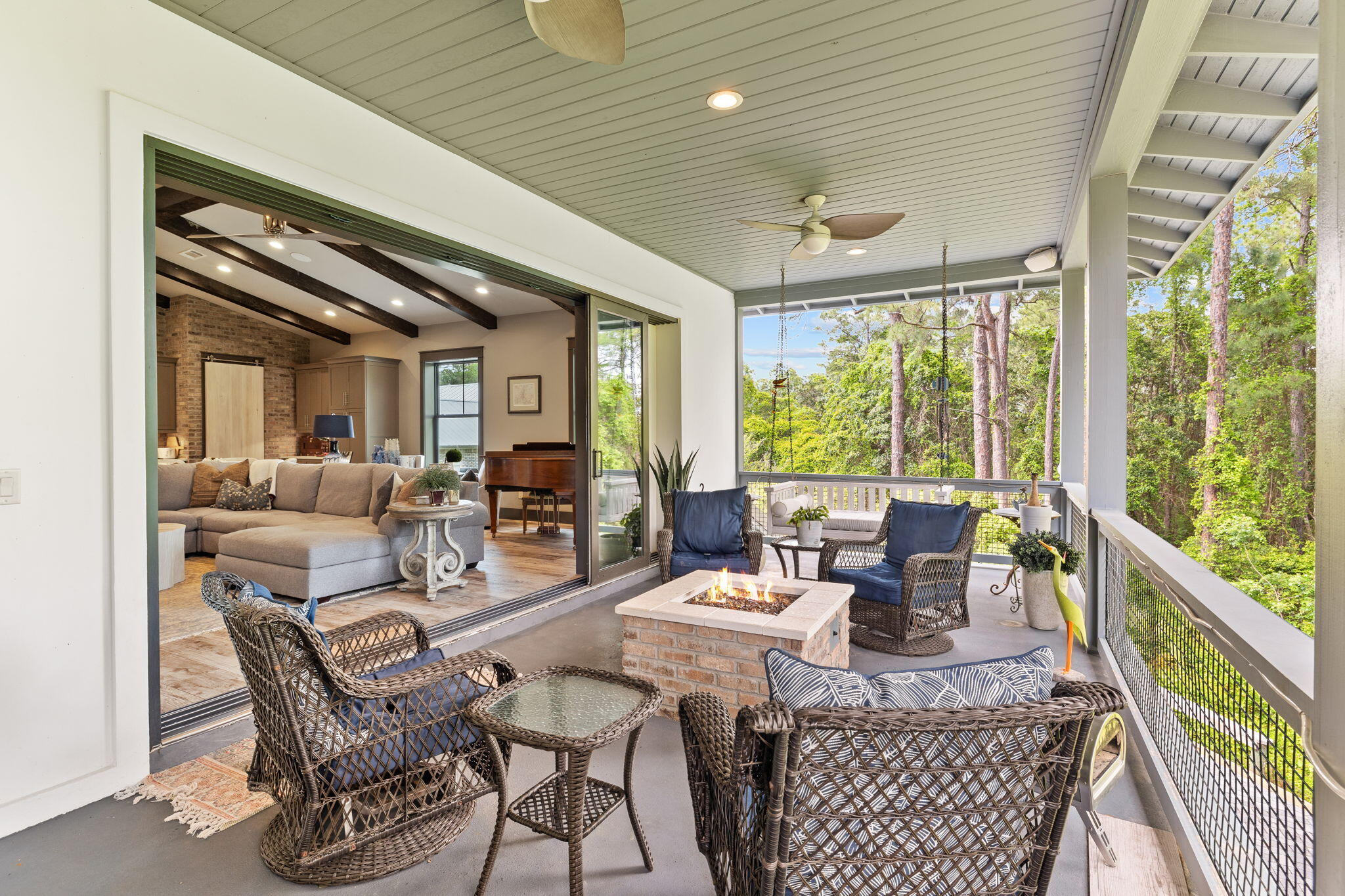 140 Beth Lane Santa Rosa Beach, FL 32459 - Photo 8 of 57 a dining room with furniture large windows and wooden floor