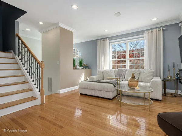 a living room with furniture and windows