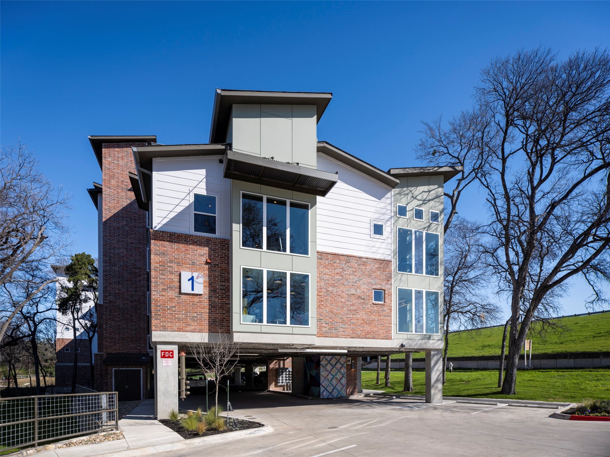 1800 South Interstate 35 Frontage Road Austin, TX 78704 - Photo 11 of 36 a front view of a house with a yard