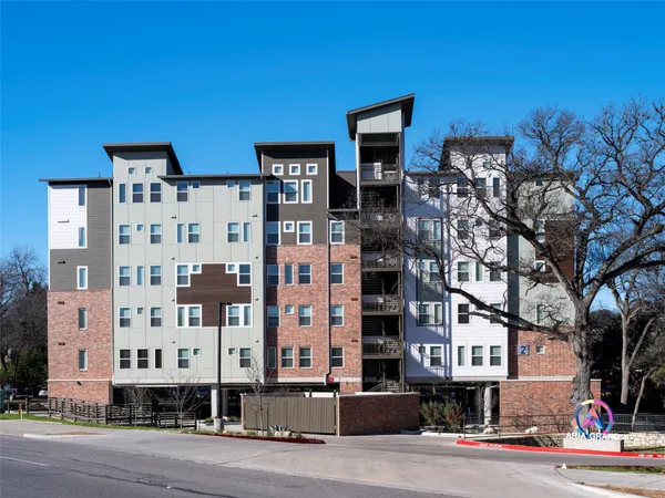 a front view of a building with street view