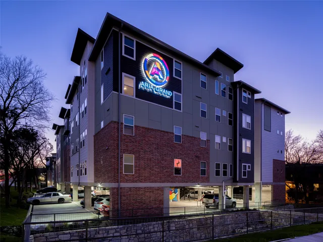 a view of a street with seating area