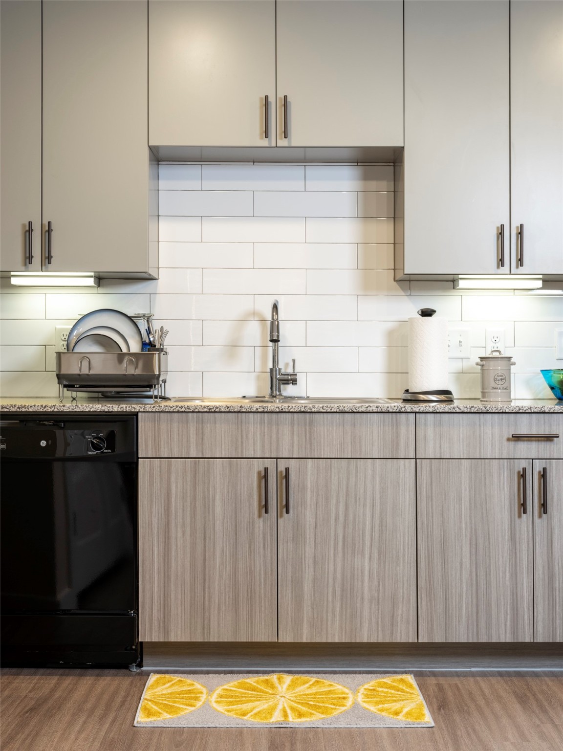 1800 South Interstate 35 Frontage Road Austin, TX 78704 - Photo 30 of 36 a kitchen with a sink a stove and cabinets
