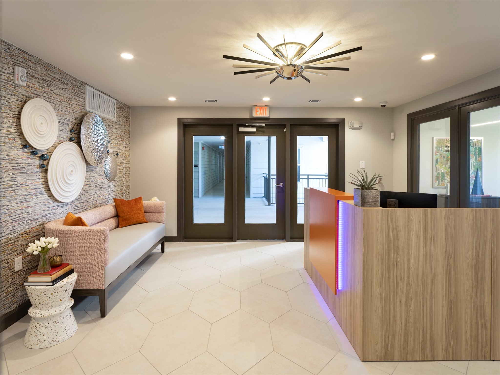 1800 South Interstate 35 Frontage Road Austin, TX 78704 - Photo 32 of 36 a living room with furniture gym equipment and a large window