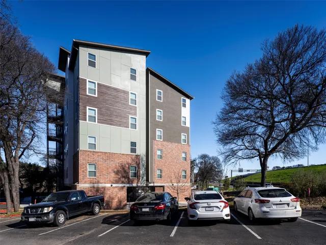 a front view of a building with street view