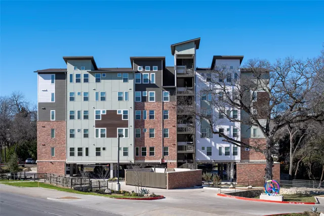 a view of building with yard