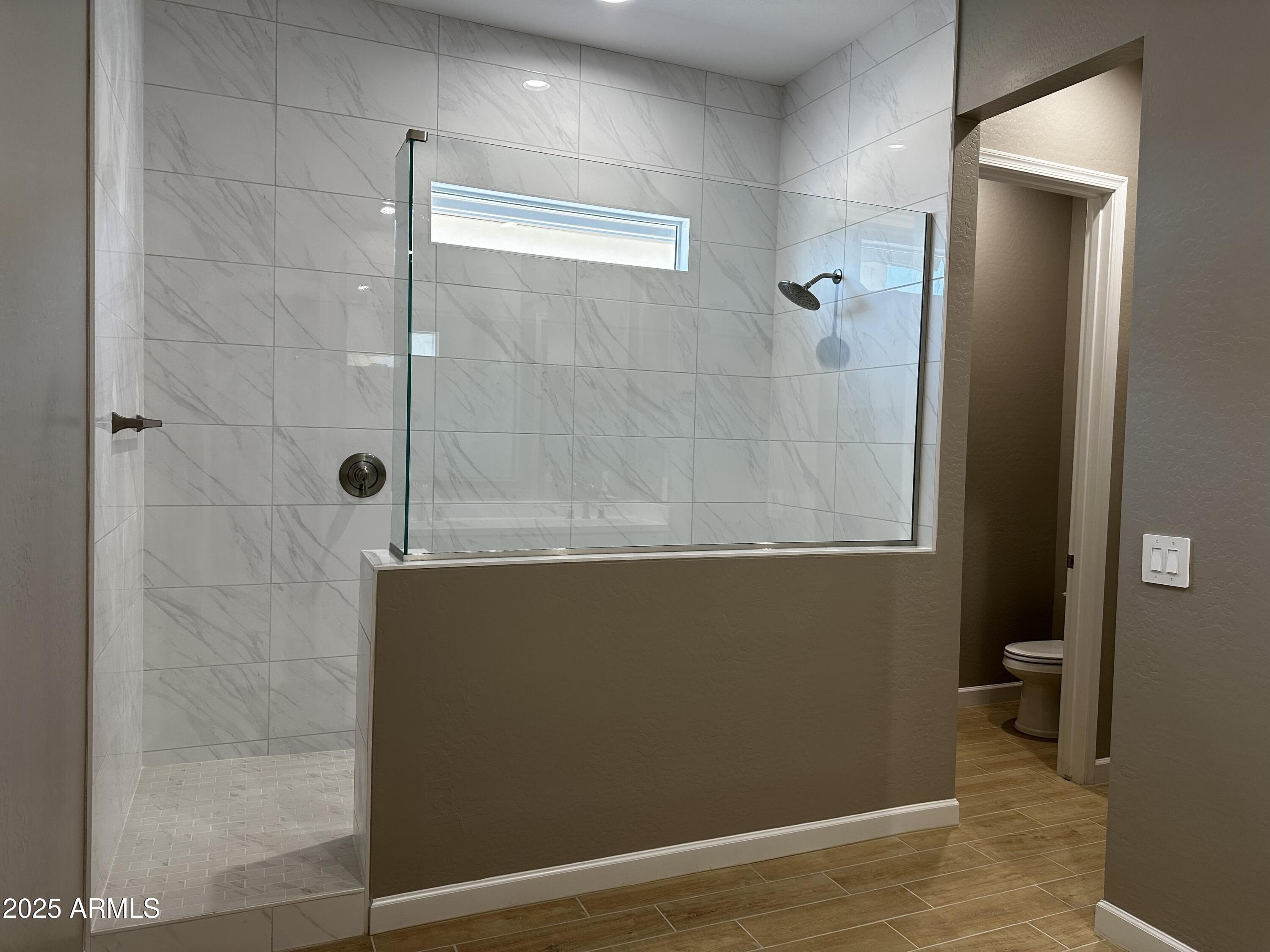 21560 North 102nd Avenue Peoria, AZ 85382 - Photo 13 of 15 a bathroom with a shower