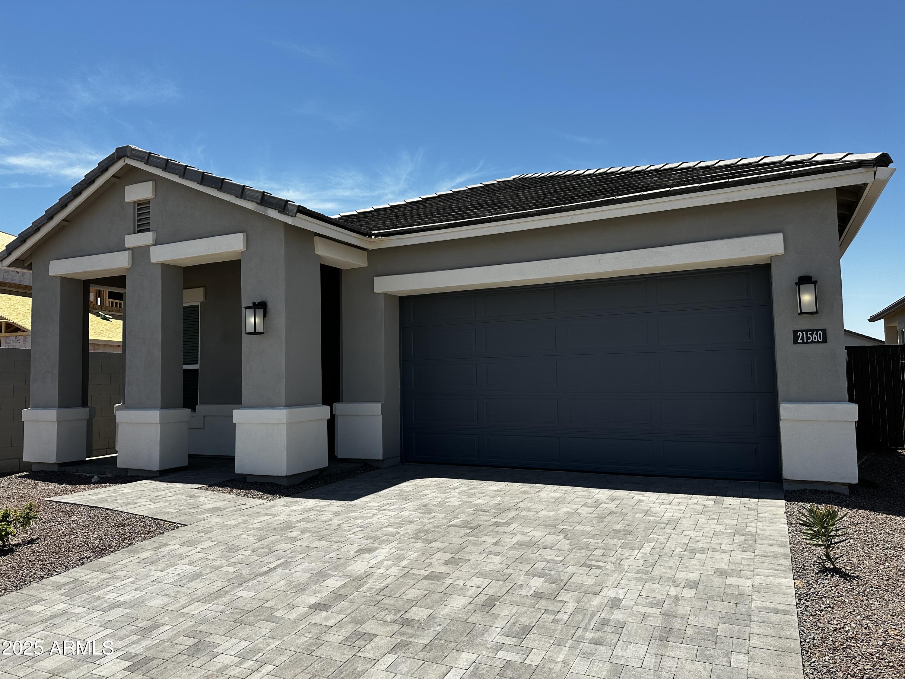 21560 North 102nd Avenue Peoria, AZ 85382 - Photo 2 of 15 a front view of a house