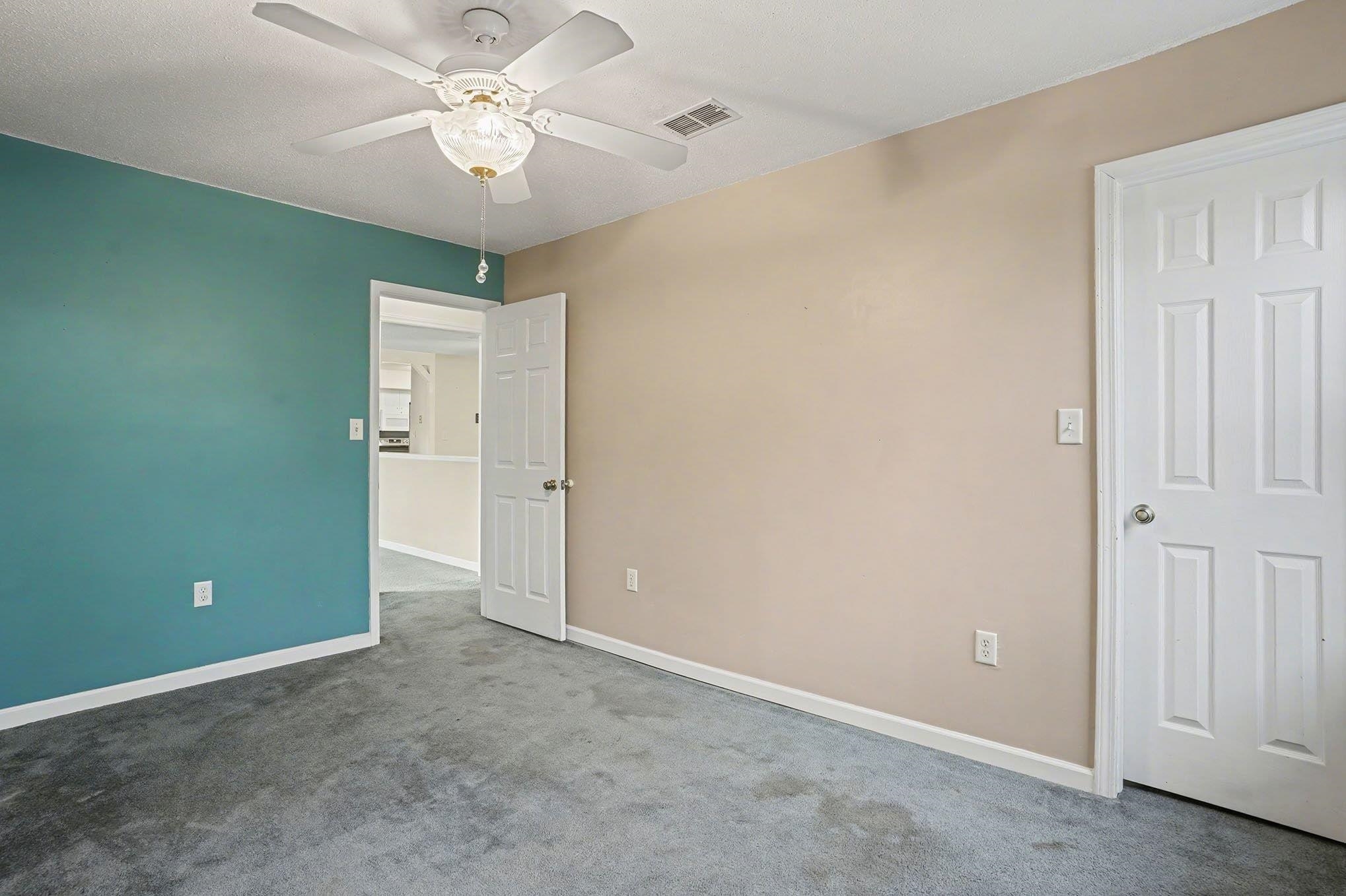 152 Brookgate Drive Myrtle Beach, SC 29579 - Photo 14 of 35 Carpeted empty room with baseboards and a ceiling fan