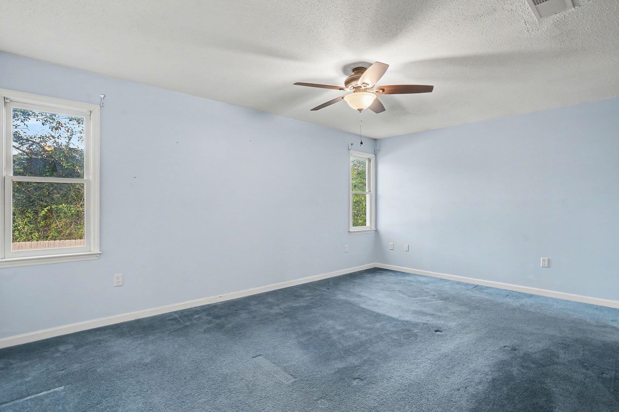 152 Brookgate Drive Myrtle Beach, SC 29579 - Photo 15 of 35 Spare room with carpet, ceiling fan, and a textured ceiling