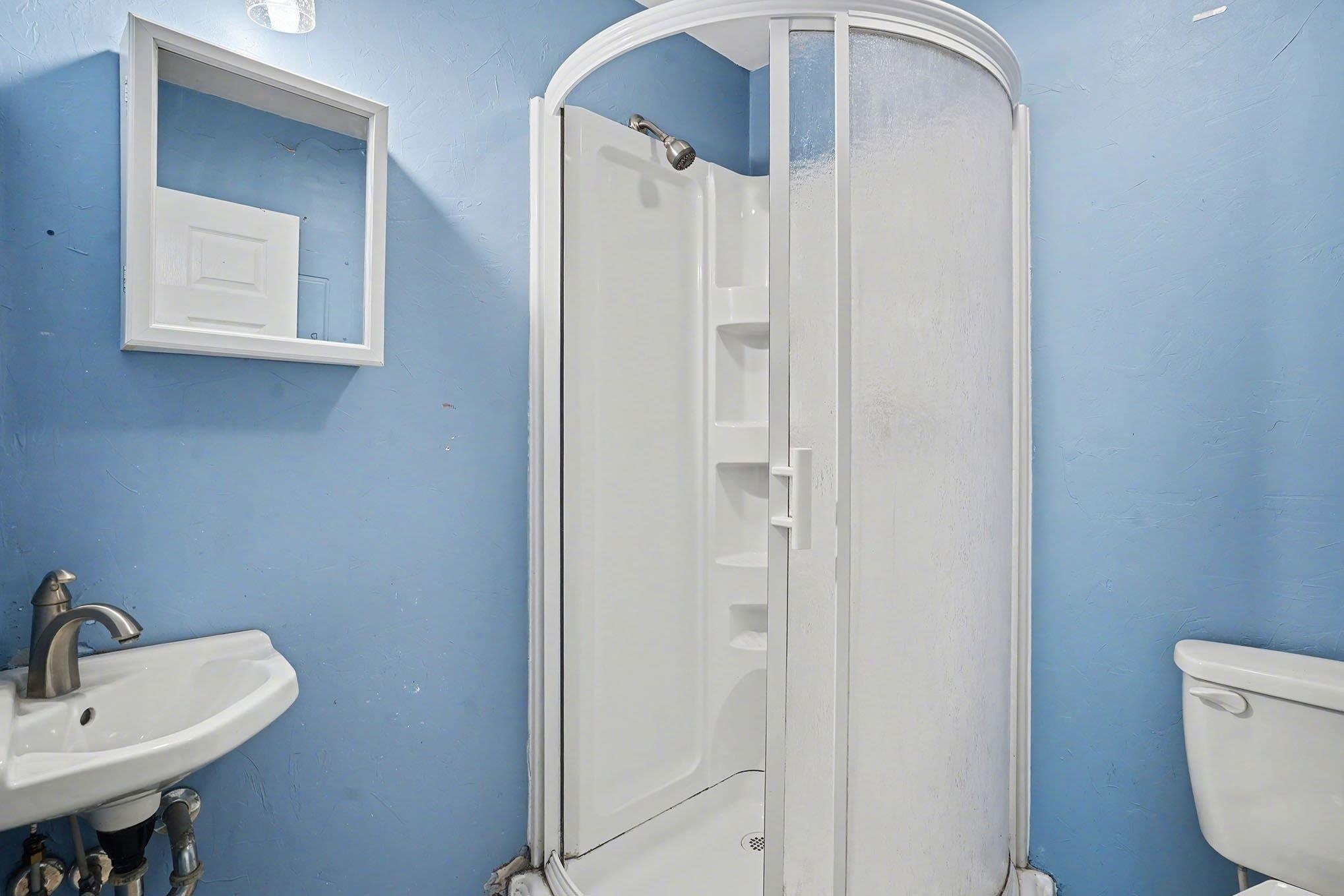 152 Brookgate Drive Myrtle Beach, SC 29579 - Photo 23 of 35 Full bath with a stall shower and a textured wall