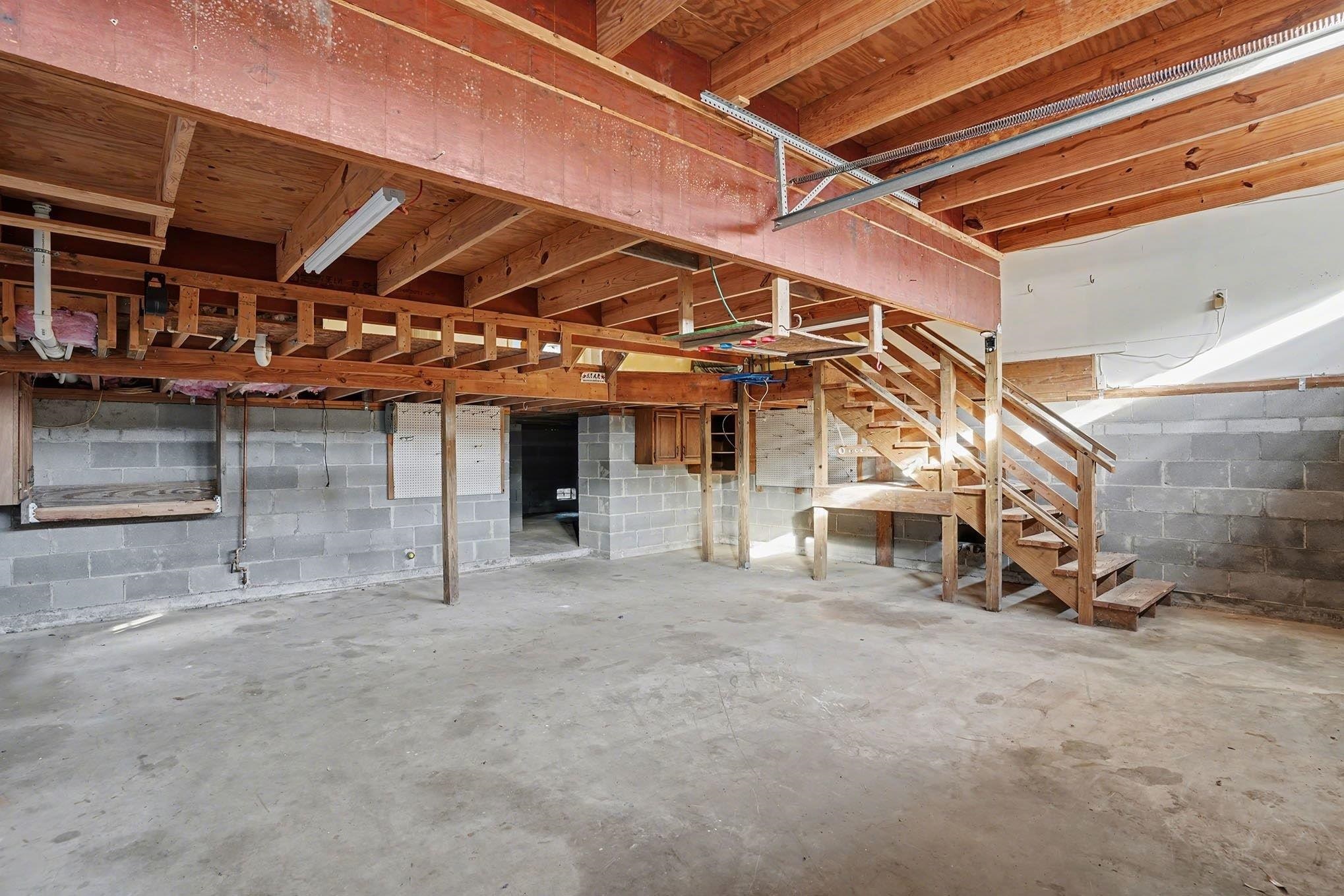 152 Brookgate Drive Myrtle Beach, SC 29579 - Photo 27 of 35 Unfinished below grade area featuring stairs