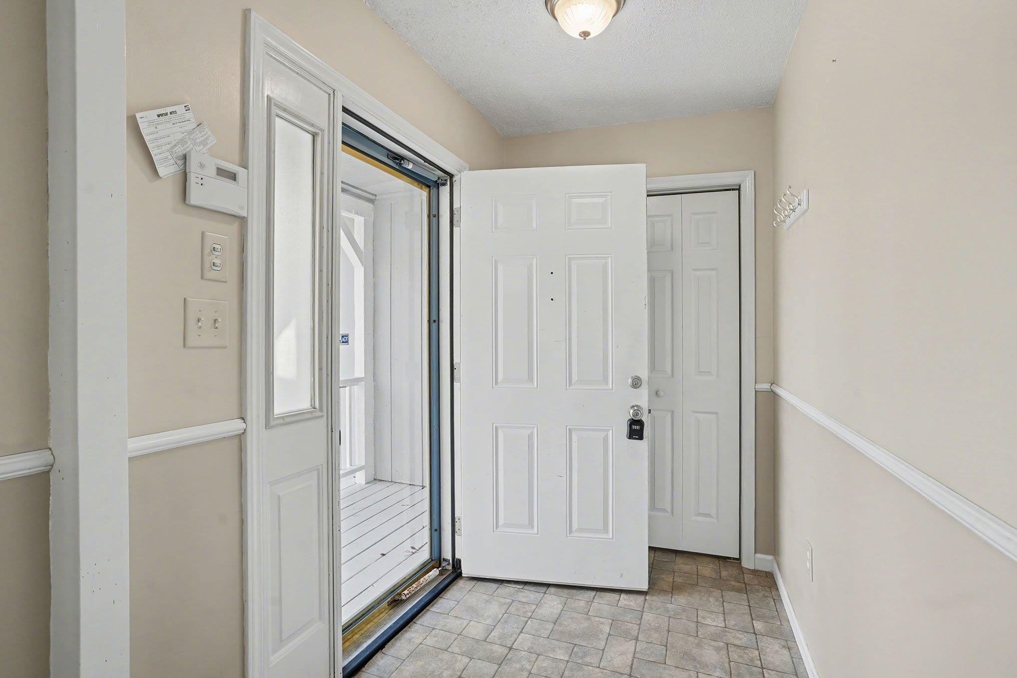 152 Brookgate Drive Myrtle Beach, SC 29579 - Photo 2 of 35 Entrance foyer featuring stone finish flooring and baseboards