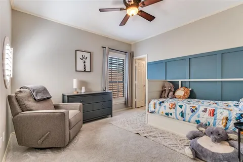 a bedroom with a bed and furniture