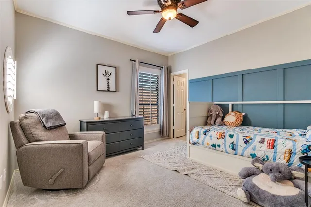 a bedroom with a bed and furniture