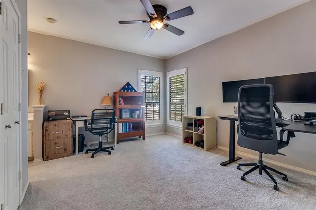 a view of a workspace with furniture and a livingroom